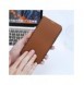 Dux Ducis Skin X2 skal till iPhone 14 Pro skal med magnetisk flik brun