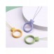 A silicone lanyard for a phone bear ring on a finger orange
