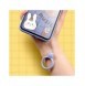 A silicone lanyard for a phone bear ring on a finger orange